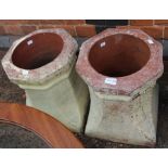 A pair of plain low terracotta chimney planters