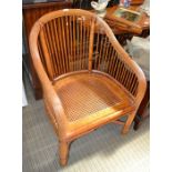 A cane bedroom chair together with a Stag bedside cabinet, a/f