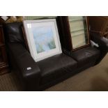 A brown leatherette two seater sofa