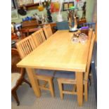 A beech wood kitchen table together with six chairs, 183cm x 92cm