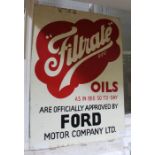 An enamel on tin "Filtrate oils" sign