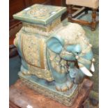 A ceramic Oriental garden seat in the form of an elephant