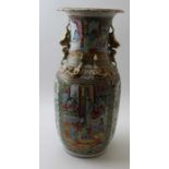 A 19th century Chinese Canton famille rose porcelain vase, having moulded and gilded Buddhist lions