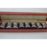 Cartier, a cased set of eight sterling silver individual pepper pots, of tapering octagonal form, 4c