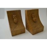 Robert Thompson "Mouseman" of Kilburn, a pair of oak bookends, featuring signature mouse on each slo