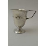 Albert Edward Jones, An Arts & Crafts silver Christening mug, planished body, banded with a rope twi