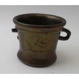 A 17th century bronze mortar, 12cm high