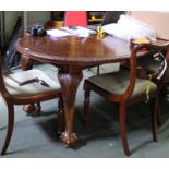 First quarter 20th century mahogany wind out dining table on carved cabriole legs with ball