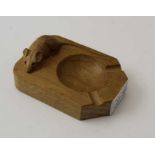Robert Thompson "Mouseman" of Kilburn, an oak ashtray, with signature carved mouse, 10cm x 7cm