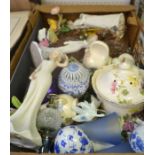 A box containing a varied selection of domestic china