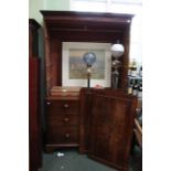 A 19th century mahogany press of typical form & construction, twin cupboard doors above a four drawe
