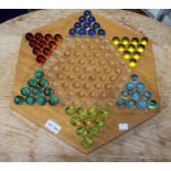Multi player marble game with wooden board