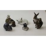 A collection of seven Royal Copenhagen ceramic figures includes; cat, squirrel, otter and mice