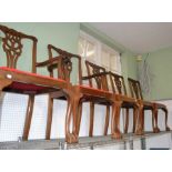 Ten fancy pierced backed dining chairs, with upholstered drop in seat pads, to include a set of six,