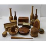 A collection of Treen, includes lidded boxes, money box, turned vases etc