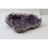 A large amethyst geode, 32cm x 22cm