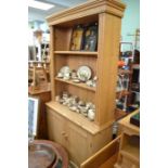 A 20th century pine two part dresser of traditional form