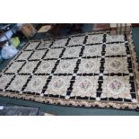 A large tapestry wool work carpet