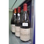 Four mixed bottles of Rhone red wine