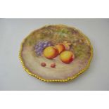 A Royal Worcester bone china plate, hand painted floral decoration, signed J. Reed, 27cm in diameter