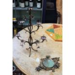 19th century cast and gilded floral design mirror and a metal five sconce candlestick