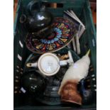 A crate containing a selection of ceramic wares and glass including tiles and a cockatoo