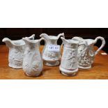 A collection of five Portmeirion British heritage collection jugs