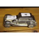 A silver plated model/moneybox example of a Rolls Royce