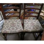 A set of six tapestry seated bar back dining chairs