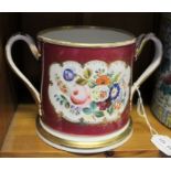 A mid 19th century Staffordshire porcelain presentation loving cup with hand painted flowers