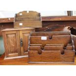 An oak locked possible smokers cabinet with two oak letter racks