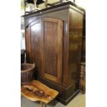A double mahogany wardrobe over two drawers