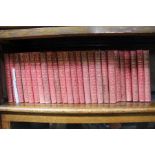 A set of Walter Scott Waverley novels in soft red leather 25 volumes