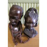 A pair of African hardwood busts, a man and a woman