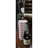A pink ceramic large table lamp plus an empty Moet magnum