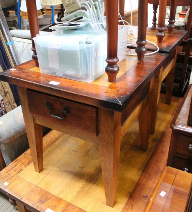 A pair of modern rustic side tables with single drawers