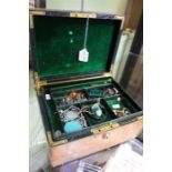 A Crocodile leather effect jewellery case with costume jewellery contents
