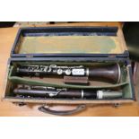 A Hawkes & Sons rosewood clarinet in case