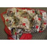 A vintage red ground patchwork throw