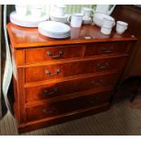 A reproduction chest of drawers
