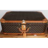 A Louis Vuitton suitcase, 80cm x 53cm x 26cm