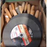 A box of trowels with a selection of cutting disks