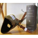 A vintage American handheld stereo scope viewer "Underwood and Underwood" NYC with a box of