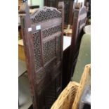 An Indian carved & pierced four panel teak screen, 170cm high