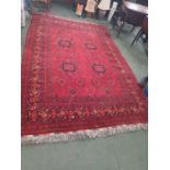 A quality woven woollen Middle Eastern floor carpet, having multi lozenge central field, within nume