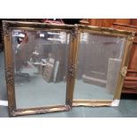 A pair of gilt framed bevel edged wall mirrors