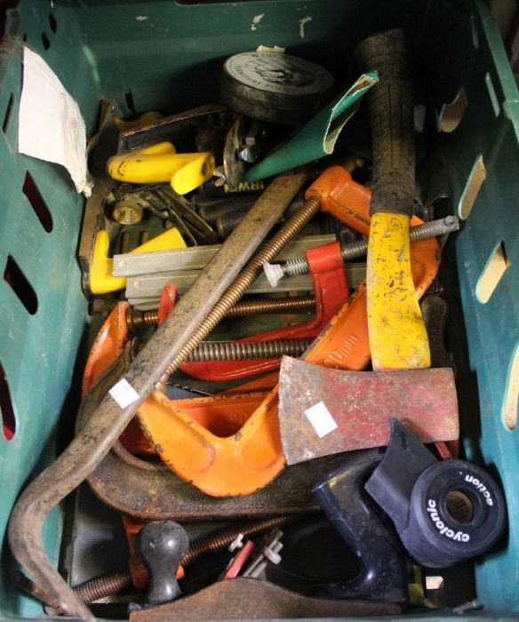 A crate containing clamps, planes, etc.