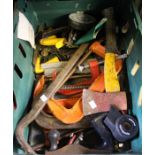 A crate containing clamps, planes, etc.