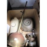 A box containing parts of a Tilley lamp, stone water bottle etc