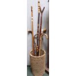 A selection of sticks in a wicker stick stand